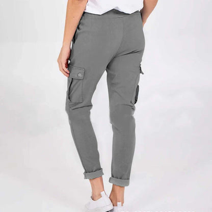 Stylish women's cargo pants with drawstring waist, pockets, and solid colour design