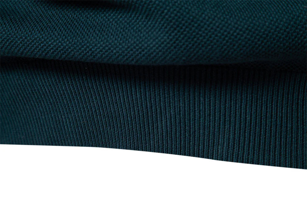 A stylish, slim-fit sweater in a modern colour-blocking design of Lake Green, White, and Grey, made with premium cotton for exceptional comfort and New Zealand casual style.