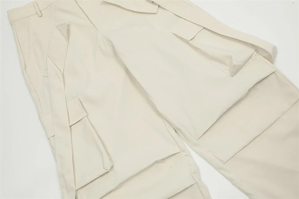 Stylish black overalls with pleated pockets, designed for the active Kiwi lifestyle