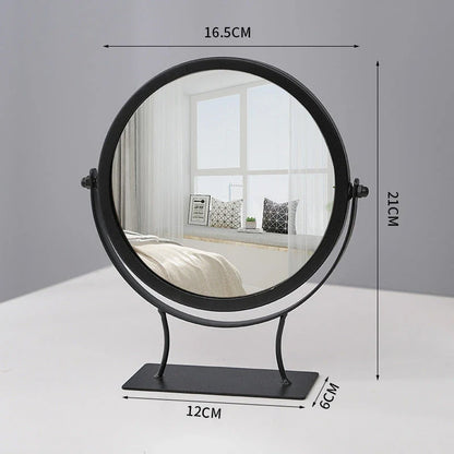 Elegant metal vanity mirror with polished silver mirror and built-in jewelry storage compartments