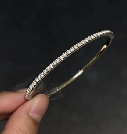 A beautiful 925 sterling silver bracelet with a fine row of sparkling diamonds, perfect for the fashion-forward Kiwi woman.