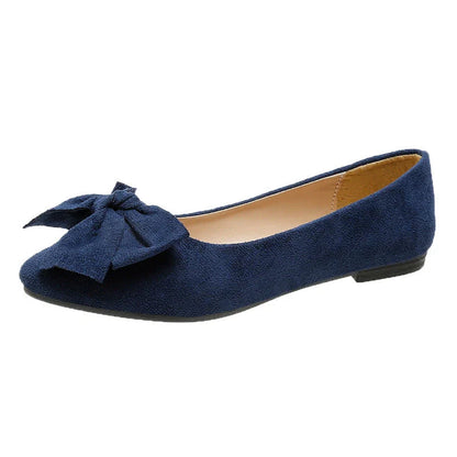 Stylish flat shoes with a pointed toe, low heel, and bow accent, designed for Kiwi women's casual and fashion-forward wardrobes.