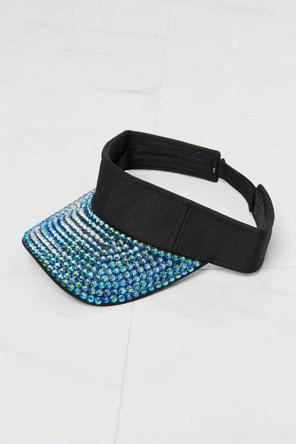 A classic black visor hat with a multi-coloured rhinestone trim, providing sun protection and fashionable style.