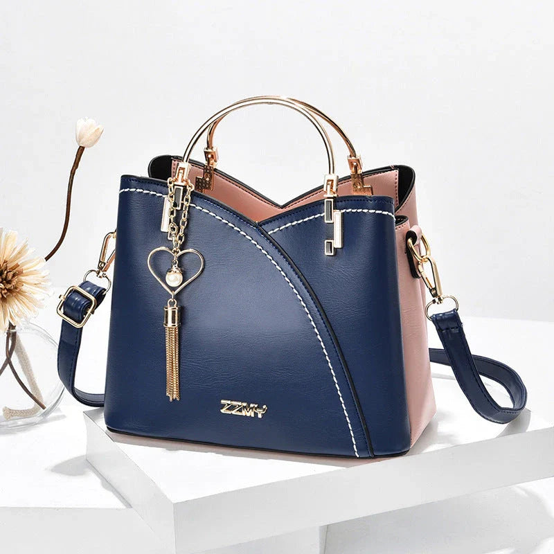 Stylish Color Block Crossbody Handbag with Trendy Tassel Accents made of premium PU leather for modern, on-the-go Kiwis