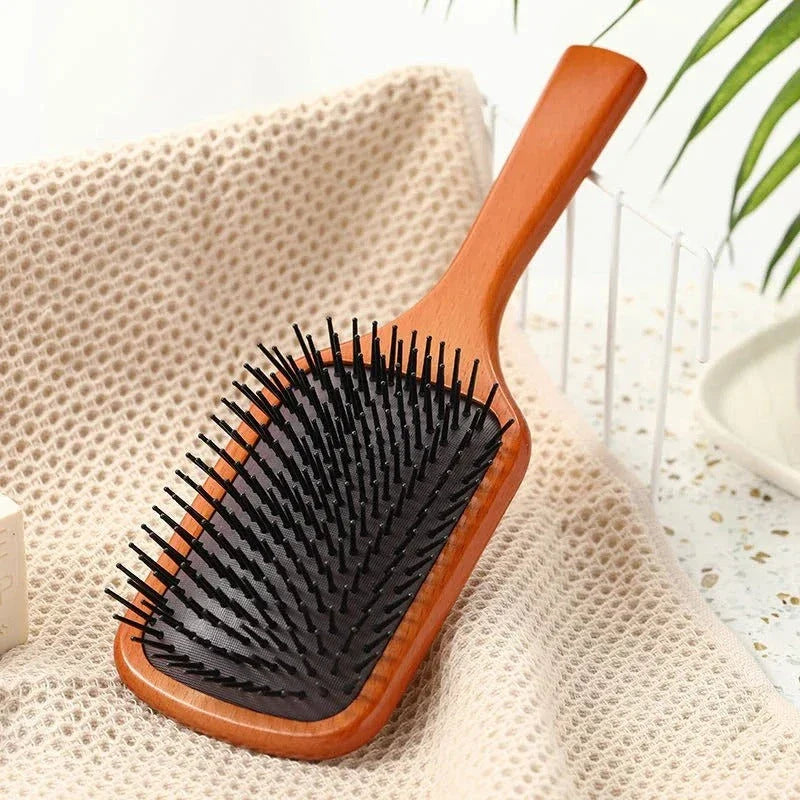 Anti-static wooden air cushion hair brush with scalp-massaging action, designed for healthy, beautiful hair