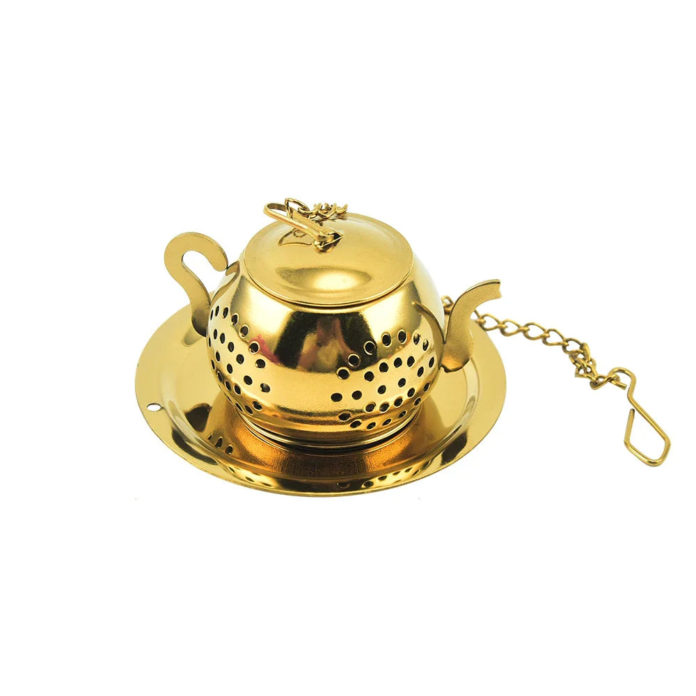 Gold pendant tea infuser with stainless steel construction and an elegant, modern design