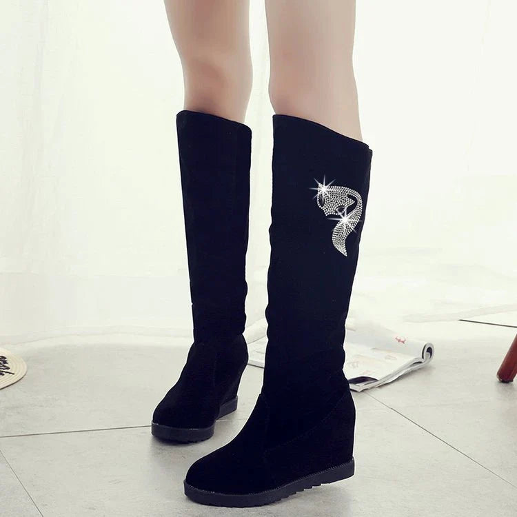 Pair of women's winter boots with rhinestone embellishments in a variety of black colour options