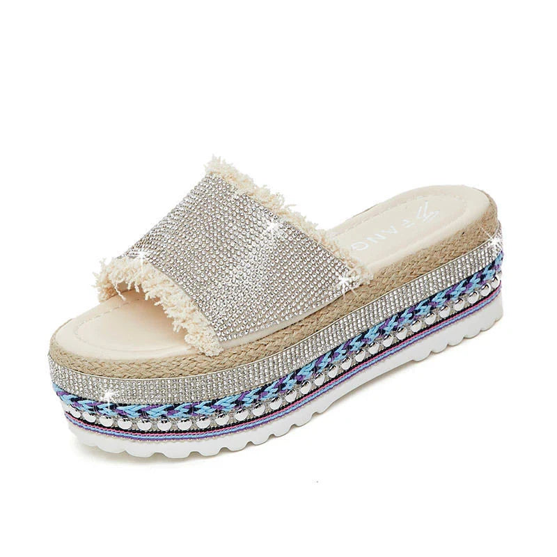 Pair of Kiwi-made Sponge Cake Slippers in beige, featuring a thick, cushioned sole for comfort and a subtle height boost