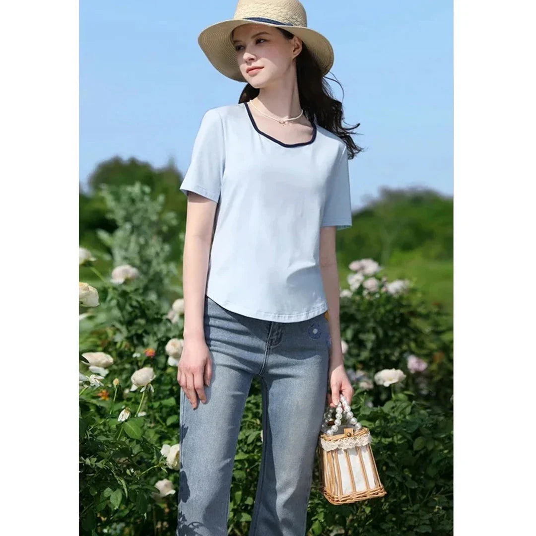 Light blue embroidered high-waisted jeans with a modern, versatile design for Kiwi women's summer fashion
