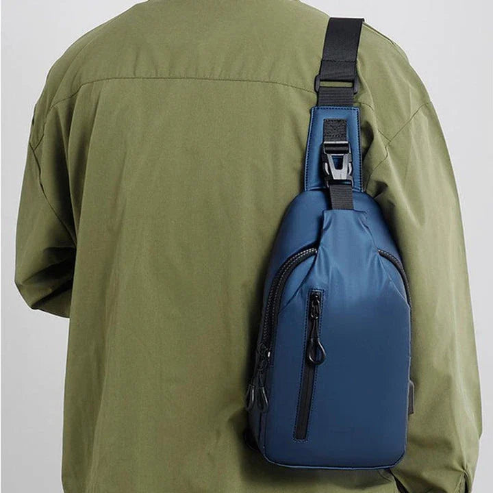 Eco-friendly sling backpack in blue, black, and grey colours with adjustable strap for hands-free wear