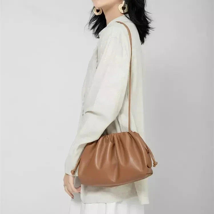 Elegant soft PU leather crossbody bag in a timeless brown colour, featuring a versatile design and premium quality construction.