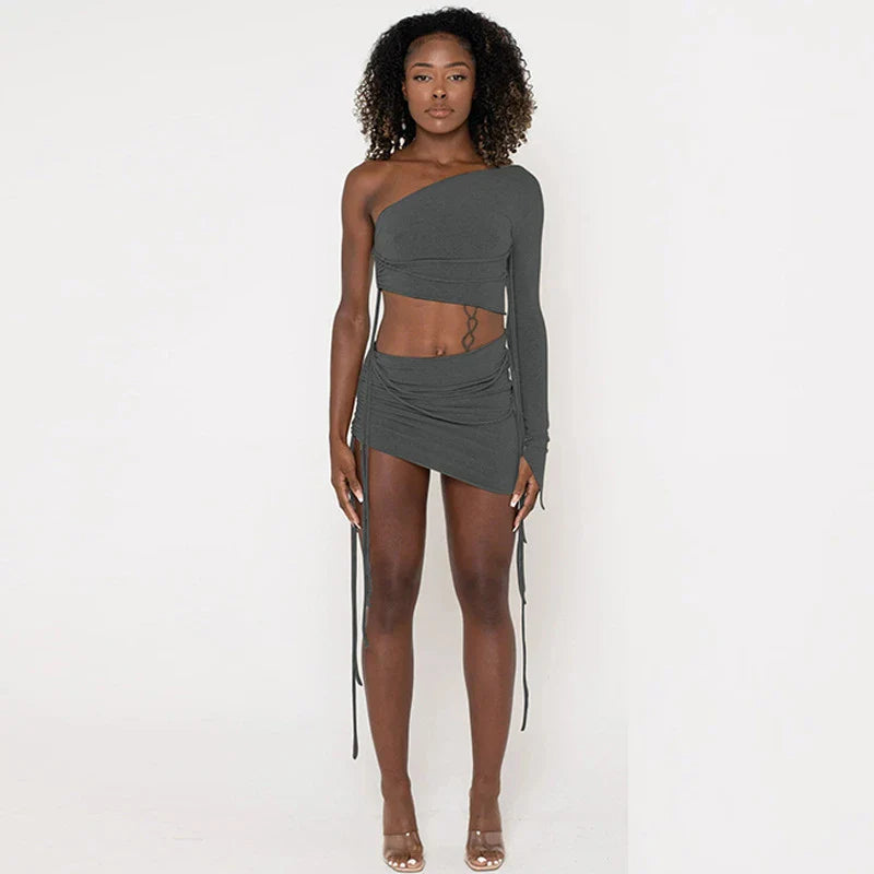 A stylish one-shoulder top and drawstring skirt set made from premium milk silk fabric, perfect for elevating your casual wardrobe.