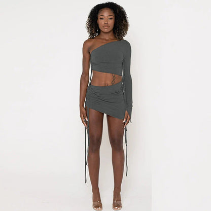 A stylish one-shoulder top and drawstring skirt set made from premium milk silk fabric, perfect for elevating your casual wardrobe.