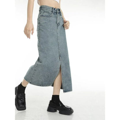 A stylish vintage-inspired denim midi skirt with a front slit, perfect for casual and special occasions.