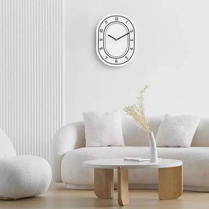 A minimalist, white wall clock with a clean design that adds a touch of modern sophistication to any Kiwi home.