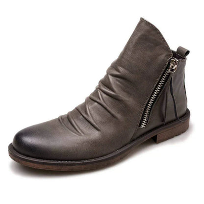 Premium Kiwi-crafted Chelsea boots with sleek, pointed toe and comfortable low heel for versatile casual wear