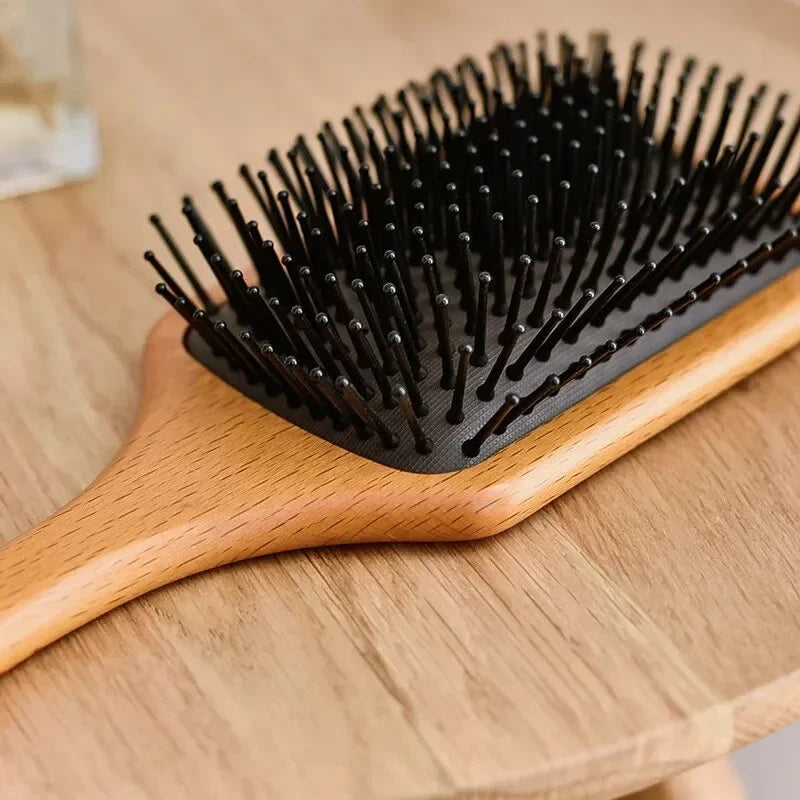 Anti-static wooden air cushion hair brush with scalp-massaging action, designed for healthy, beautiful hair