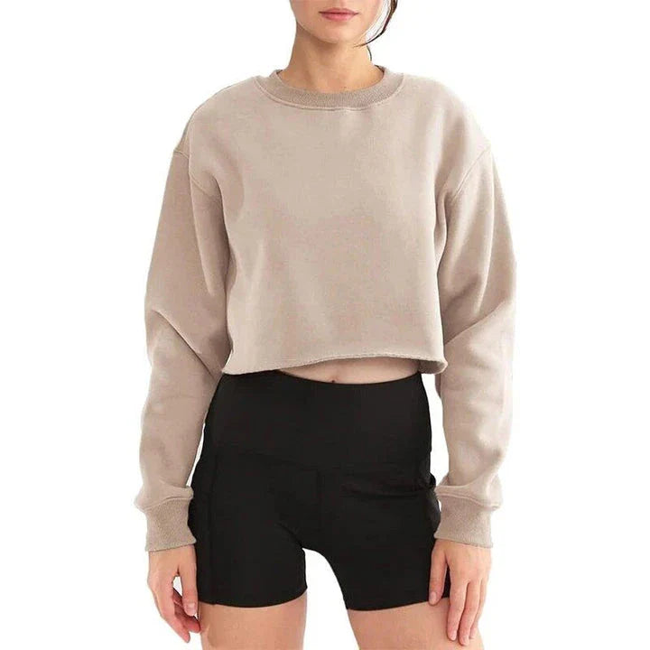 A stylish oversized cotton-blend sweatshirt in a solid gray color, perfect for autumn and winter in New Zealand.