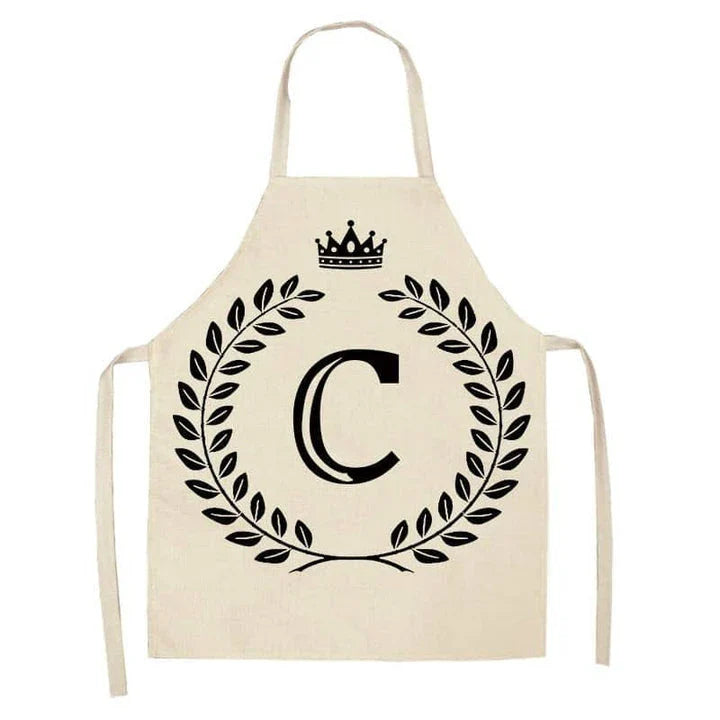 A crown and letter printed kitchen apron made of high-quality cotton and linen, suitable for both men and women in New Zealand kitchens.