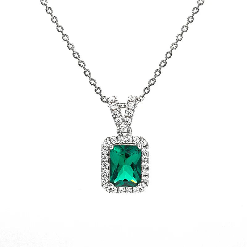 Gleaming emerald clavicle necklace with 925 sterling silver chain and adjustable length