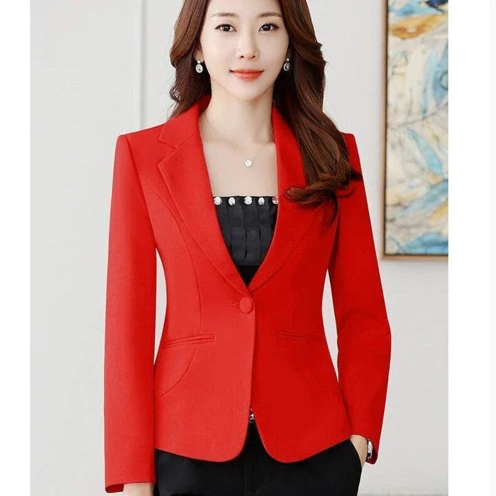 Stylish and breezy short suit jacket in a minimalist Korean-inspired design, made from high-quality polyester for lasting comfort and fashion-forward appeal.