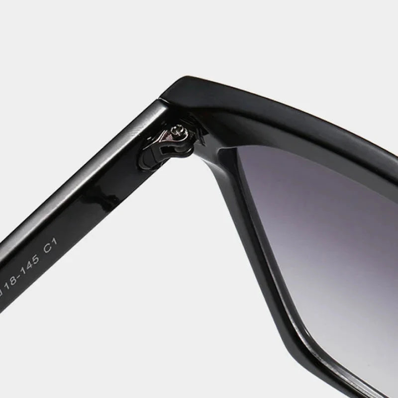 Stylish oversized square sunglasses with gradient lenses, designed for fashion-forward Kiwi women to protect their eyes from harmful UV rays.