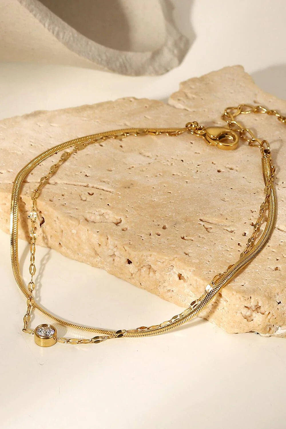 Sparkling double-layered stainless steel bracelet with rhinestone embellishments, adjustable fit for all-day comfort and style