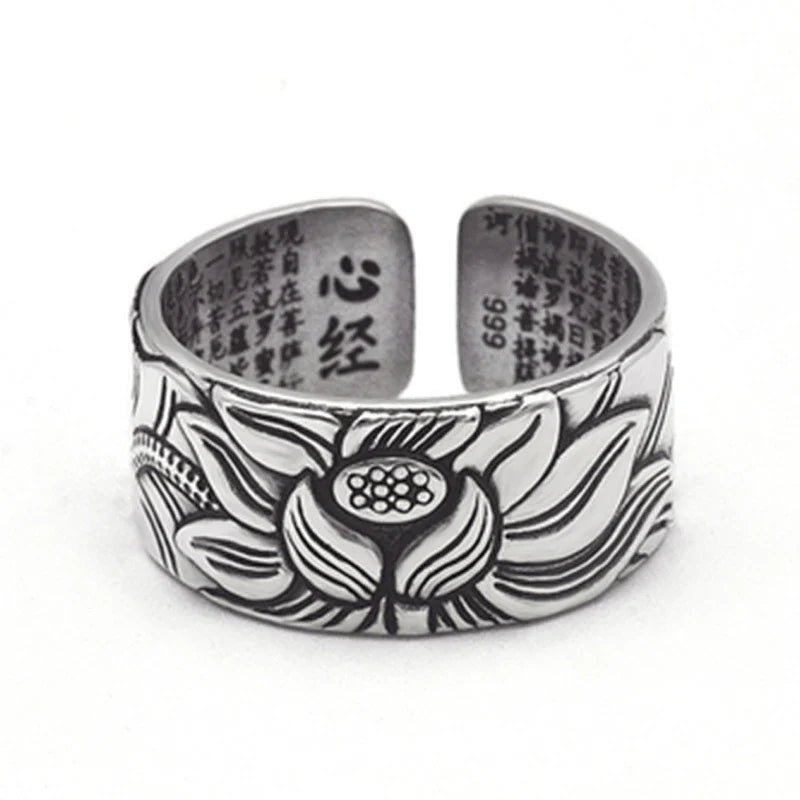 Vintage-style silver-plated Buddhism-inspired ring with lotus flower and Heart Sutra engraving, adjustable size for comfortable fit