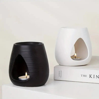 Elegant porcelain aroma diffuser in white and black colours, perfect for creating a relaxing atmosphere in your New Zealand home