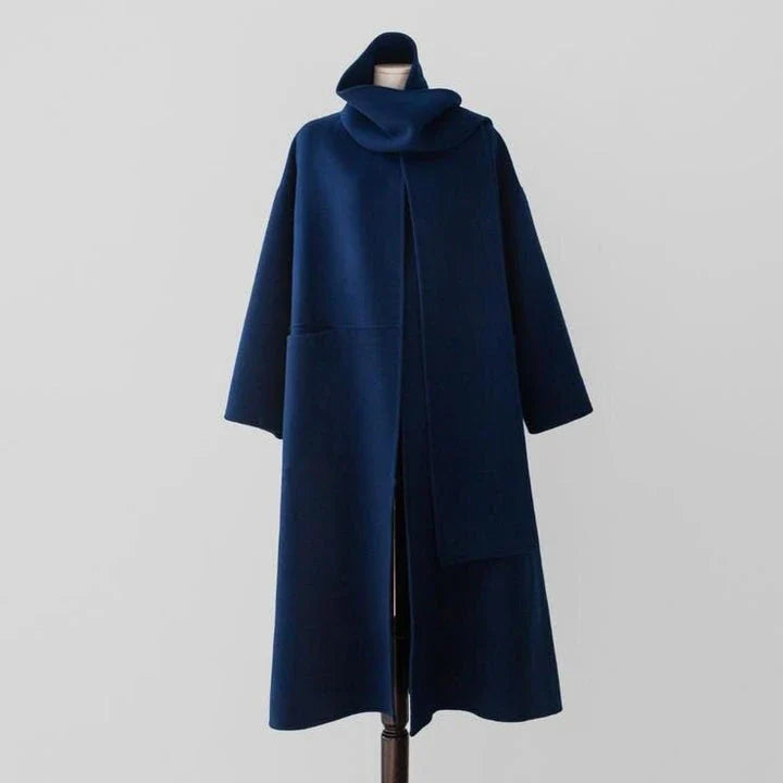 Stylish and warm New Zealand women's woollen coat in blue, featuring a chic scarf collar and relaxed fit design.