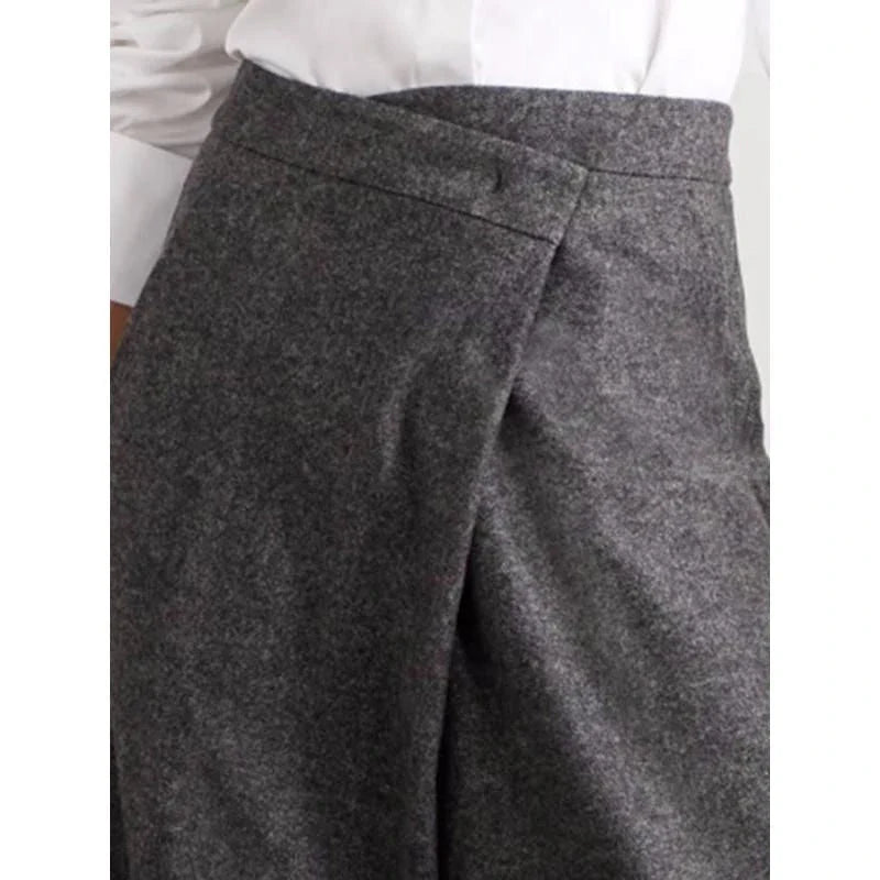 Chic high-waist woollen wide-leg pants with asymmetric details, perfect for the modern Kiwi woman's winter wardrobe