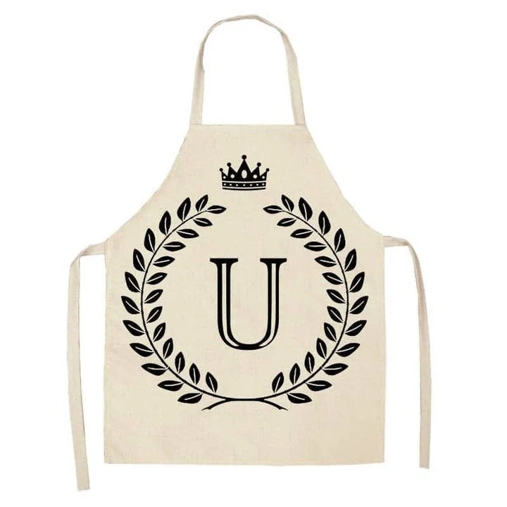 A crown and letter printed kitchen apron made of high-quality cotton and linen, suitable for both men and women in New Zealand kitchens.