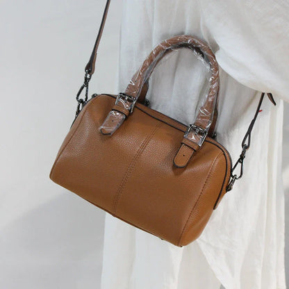 Classic leather shoulder bag in brown with a soft, pillowy shape and cotton lining for ultimate comfort and style