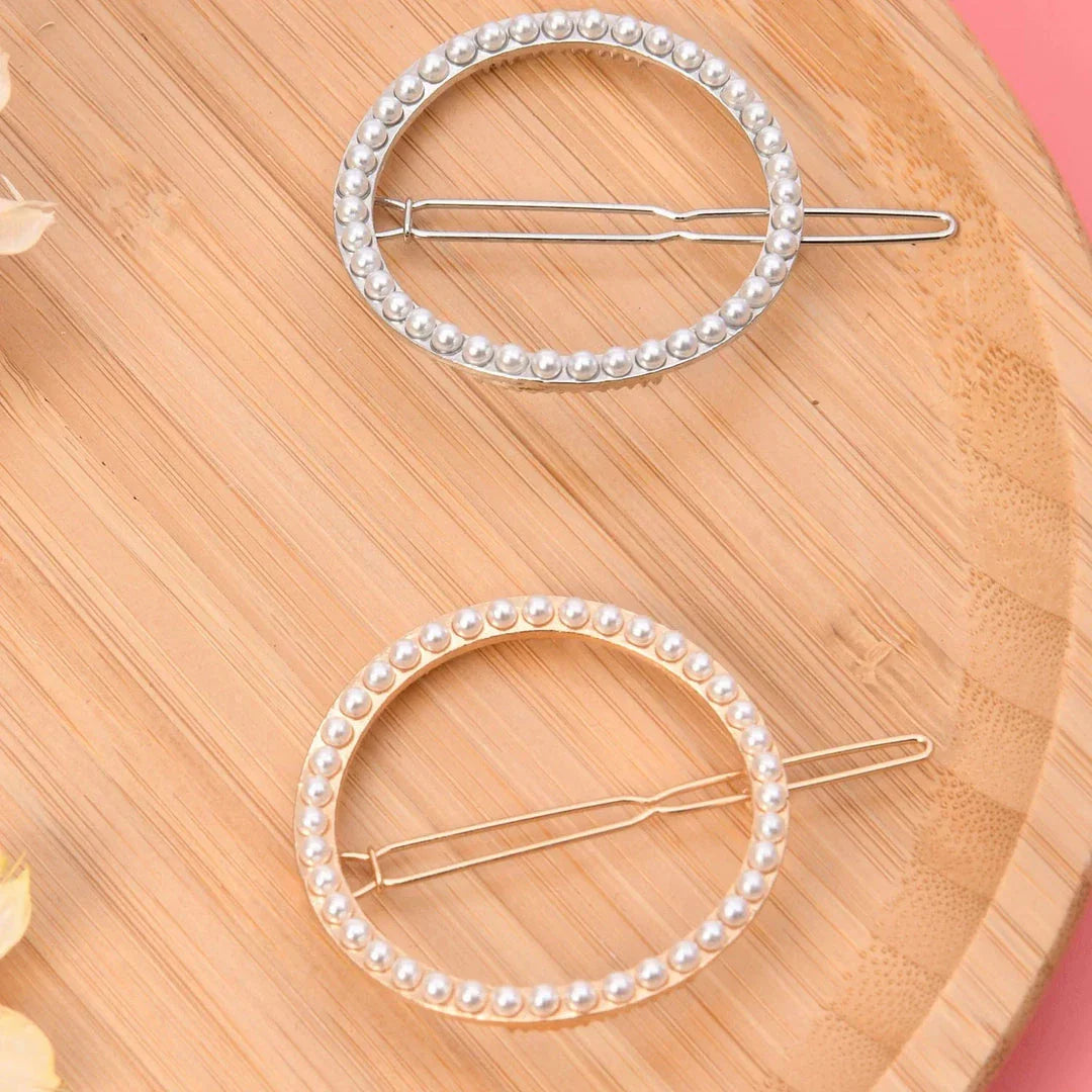 Elegant pearl and geometric hairpins in silver and gold tones, designed to elevate Kiwi women's hairstyles for any occasion.