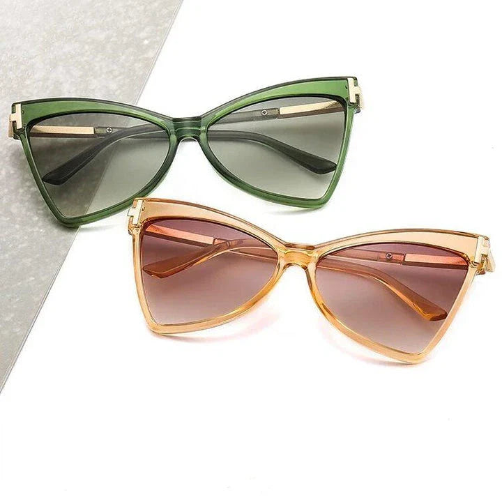 Chic cat-eye sunglasses with a sleek metal frame and vibrant color lenses, providing premium UV400 protection for Kiwi wearers