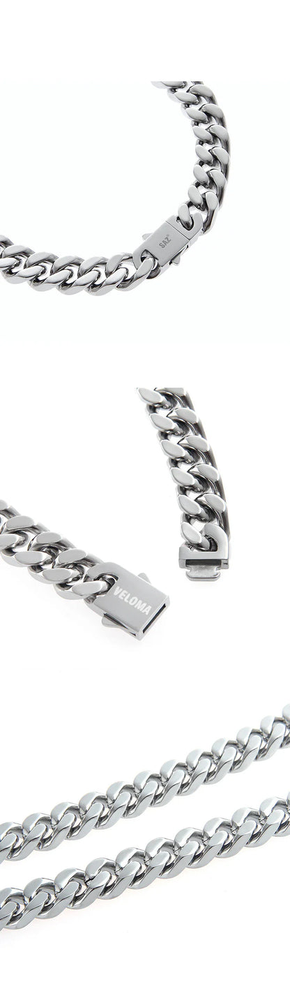 Stylish titanium steel bracelet with Cuban-inspired design, adjustable length, and polished finish.