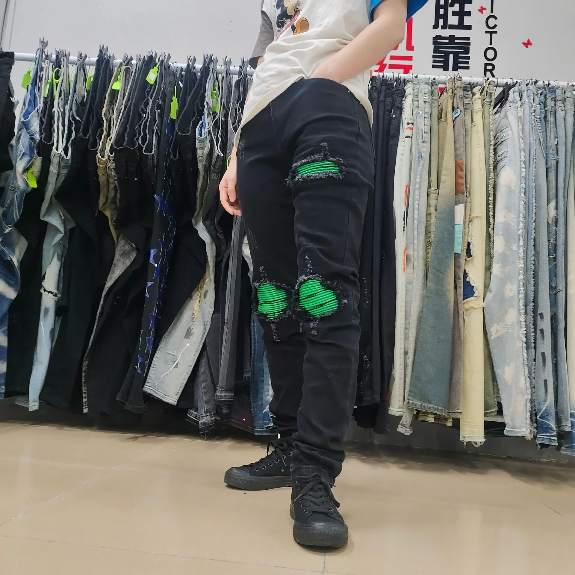 Men's Black Ripped Jeans with Green Patchwork Sustainable Fashion Design