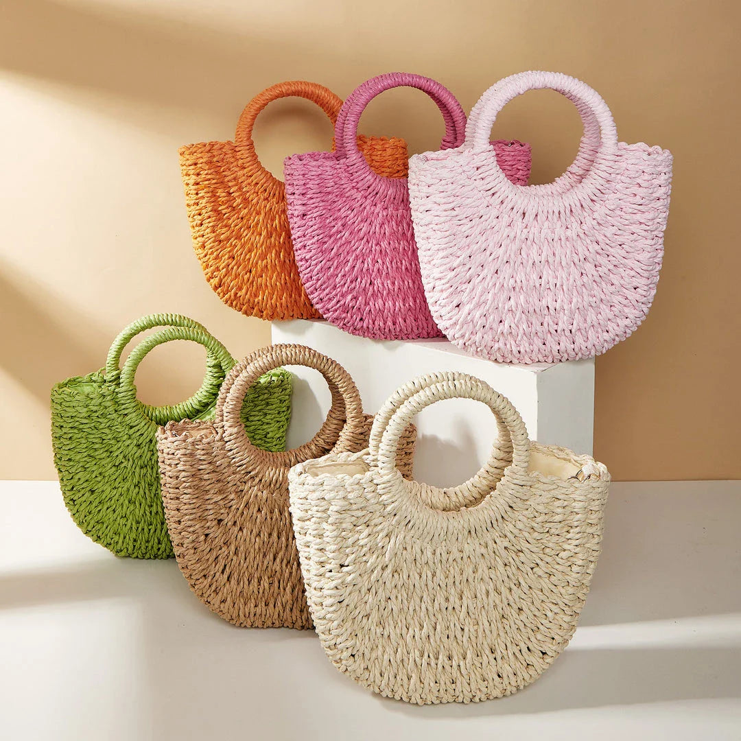 Stylish and eco-friendly straw woven beach bag for Kiwi women, featuring a unique half-moon shape, premium paper straw, and cotton lining.