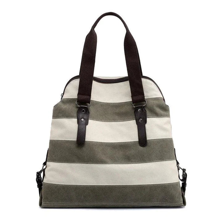 Stylish and practical Kiwi-crafted canvas tote bag with roomy interior, durable polyester lining, and adjustable shoulder straps