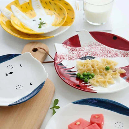 A charming ceramic plate featuring a vibrant cartoon animal pattern, perfect for adding a touch of Kiwi-inspired style to your dining table.