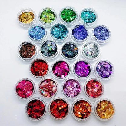 Assortment of laser holographic chunky nail glitters in various vibrant colors and sizes