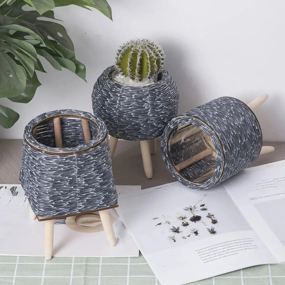 Hand-woven rattan planter with lush greenery, perfect for indoor and outdoor display