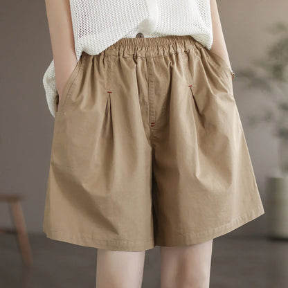 Comfortable and stylish Mori Girl-inspired cotton shorts in a solid coffee color, perfect for Kiwi summer adventures.