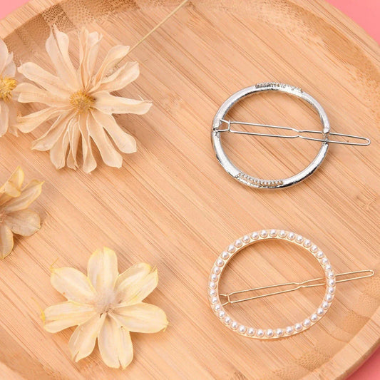 Elegant pearl and geometric hairpins in silver and gold tones, designed to elevate Kiwi women's hairstyles for any occasion.