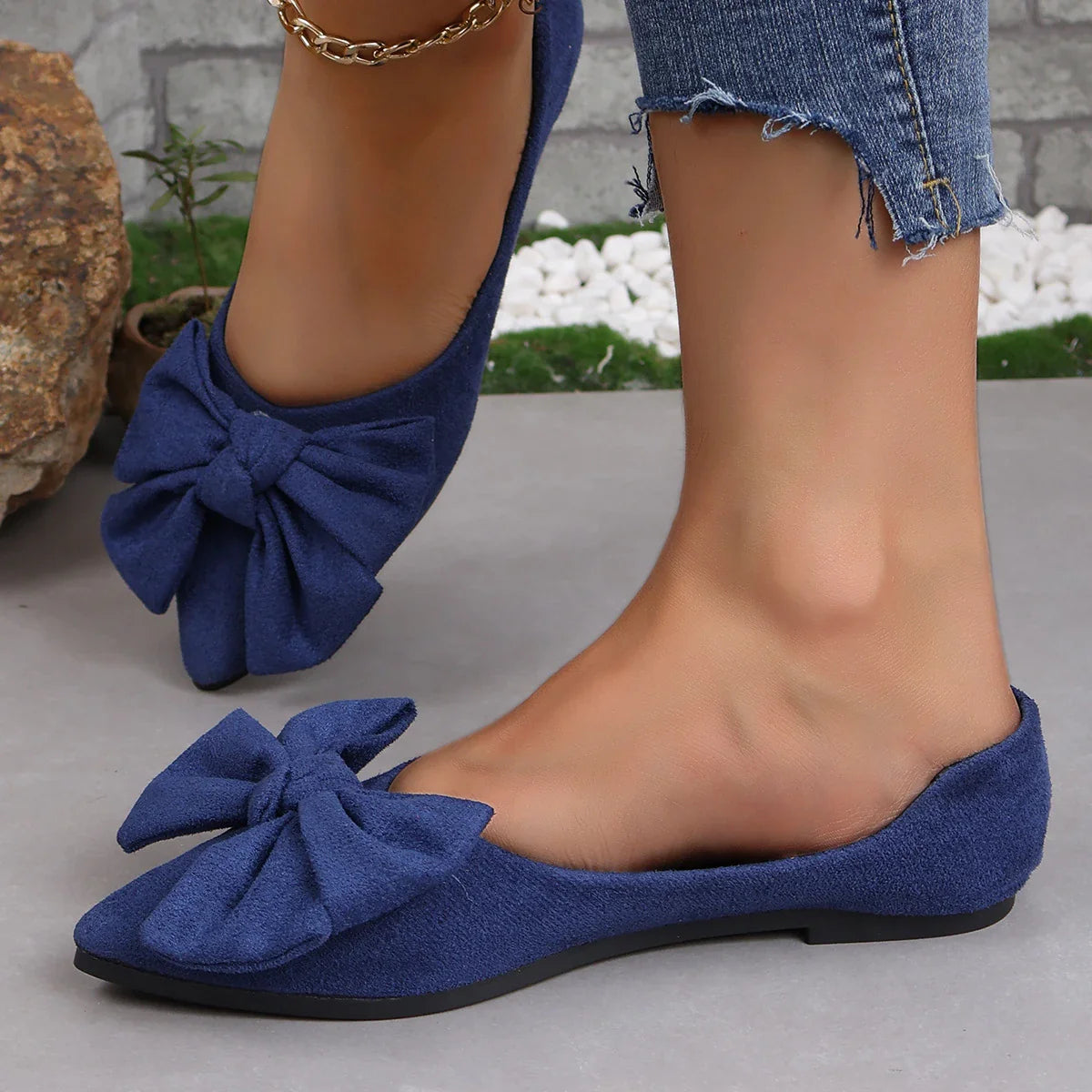 Stylish flat shoes with a pointed toe, low heel, and bow accent, designed for Kiwi women's casual and fashion-forward wardrobes.