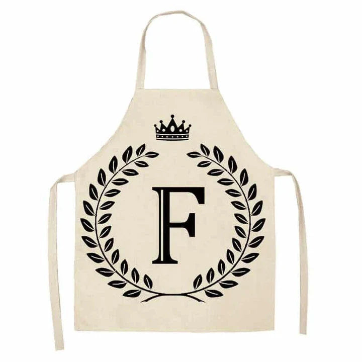 A crown and letter printed kitchen apron made of high-quality cotton and linen, suitable for both men and women in New Zealand kitchens.