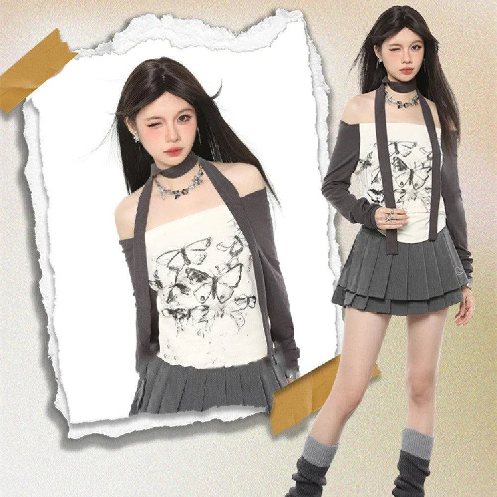 Stylish off-shoulder long sleeve top with elegant butterfly print design, slim-fit silhouette, and short length for a flattering, chic look.