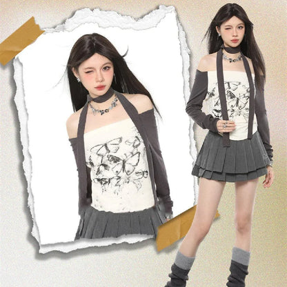 Stylish off-shoulder long sleeve top with elegant butterfly print design, slim-fit silhouette, and short length for a flattering, chic look.