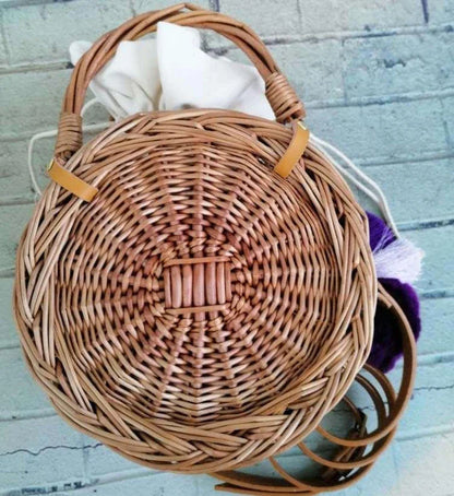 Elegant natural rattan hanging basket with princess-inspired design, perfect for Kiwi-style decor