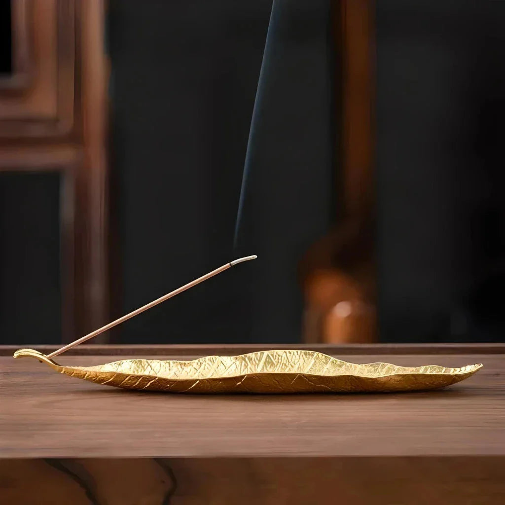 Elegant copper incense stick holder with Bodhi leaf design, perfect for creating a peaceful, serene atmosphere in your New Zealand home